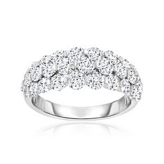 a white gold ring with three rows of diamonds on the side and two rows of round stones