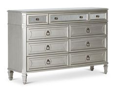 a large silver dresser with mirrored drawers on the top and bottom drawer, in front of a white background