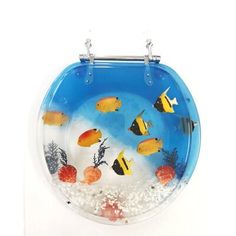 a blue toilet seat with fish in the water and corals on it's side