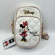 Reposhing This Item I Purchased From @A_mini_madness. Loved It, But Ready To Rotate For Something New. This Item Is New With Tags! His Disney Minnie Mouse Crossbody Bag Is Perfect For Any Fan Of The Beloved Character. With A Colorful And Playful Design, This Small-Sized Bag Is Great For Carrying Your Essentials On-The-Go. The Bag Features Minnie Mouse, A Popular Character From The Disney Franchise, And Is Made By Disney Themselves. Ideal For Collecting Or Using As A Statement Piece, This Bag Fit Disney Minnie Mouse White Bag, White Mickey Mouse Bag For Disney Fan Events, Cute White Mickey Mouse Bags, Casual White Minnie Mouse Bag, Disney Adult, Disney Logo, Disney Bags, Mickey Mouse Head, Disney Bag