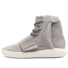 The Adidas Yeezy Boost 750 'OG' was Kanye West's first collaborative project with Adidas. The shoe features a light brown all-suede upper, mounted atop a partially ribbed rubber tooling in an Off-White shade. The minimalist design is accented with oversized rope laces, perforated detailing on the toe box, and a wide midfoot strap in a tonal twill fabrication. A hidden zipper on the lateral side provides easy on and off. The Adidas Yeezy Boost 750 'OG' was released in February 2015 in extremely l Adidas Yeezy 750 Boost, Fake Yeezys, Yeezy Boost 750, Yeezy 750, Yeezy Fashion, Gentlemen Wear, Boost Shoes, Yeezy Sneakers, Yeezy Shoes