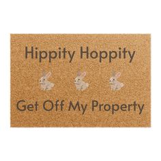 a door mat that says,'hippity hoppy get off my property '