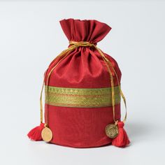 The Suruku Pai Pure Silk Traditional Indian Drawstring Potli Bag / Purse / Wristlet Will Add A Touch Of Elegance And Sophistication To Your Look. This Beautifully Designed Potli Bag Is Crafted From Pure Silk, Making It Both Sustainable And Luxurious. With Its Convenient Drawstring Closure, You Can Store All Your Small Items Like Phones, Keys, Coins, And Trinkets Safely Inside. Gift This Special Bag To Someone Special Or Keep It For Yourself - Either Way You'll Be Sure To Treasure The Suruku Pai Red Festive Bag For Festivals, Festive Red Pouch Potli Bag, Red Potli Bag For Festivals, Red Pouch As Gift, Red Potli Bag For Festivals And Gifts, Red Rectangular Pouch For Festivals, Red Pouch As A Gift, Festive Red Potli Pouch Bag, Red Festive Pouch Bag