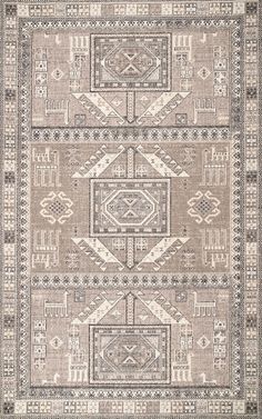 a beige and brown rug with an intricate design