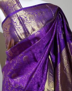 Part of our premium silks collection. Pure Kanchipuram Handloom Saree. Royal, purple saree with golden zari and matching blouse material (see last pic) Silk Mark Certified. Bollywood Style Purple Art Silk Pre-draped Saree, Purple Art Silk Pre-draped Saree With Self Design, Traditional Purple Tissue Silk Pre-draped Saree, Traditional Purple Pre-draped Saree, Purple Anarkali Style Pre-draped Saree In Art Silk, Formal Katan Silk Pre-draped Saree With Dupatta, Gold Brocade Pre-draped Saree With Zari Weaving, Traditional Purple Paithani Silk Pre-draped Saree, Purple Pre-draped Saree With Traditional Pallu