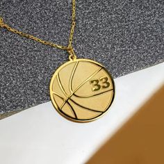 Basketball Necklace in Silver- Basketball Number Necklace - Basketball Player Charm - Sports Gifts - 925 Sterling Silver Necklace - NBA Gift ♥ P A R I N ~   B A S K E T    B A L L    ~ N E C K L A C E We present our exclusive Basketball Necklace. These Necklaces are available in 3 colors i.e. Silver, Gold & Rose Gold.   Our Basketball necklace will fill the missing part of your sports clothes and your combinations will be completed. ♥ PERSONALIZATION - - - - FREE ENGRAVING ON THE BACK SIDE OF TH Volleyball Necklace, Basketball Jewelry, Basketball Necklace, Number Jewelry, Number Necklace, Sports Jewelry, Basketball Gifts, Gold Name Necklace, Custom Name Necklace