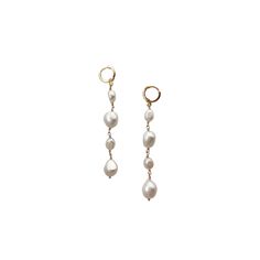 These freshwater pearl drop earrings will add a touch of luxury to any outfit. Crafted with impeccable attention to detail, these earrings feature exquisite natural pearls and a secure leverback closure. Perfect for special occasions or everyday wear. Gold plated hoops with freshwater pearls & gold filled wire. Each Pearl is unique and will vary in shape. Cheap Gold Crystal Pearl Drop Earrings, Luxury Elegant Pearl Earrings With French Hook, Luxury Everyday Dangle Pearl Earrings, Luxury Timeless Pearl Chain Earrings, Luxury Pearl Dangle Earrings With Beads, Cheap Formal Earrings With Pearl Charm, Luxury Pearl Charm Linear Earrings For Formal Occasions, Luxury Linear Pearl Charm Earrings For Formal Wear, Luxury Timeless Earrings With Pearl Chain