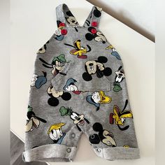 Never Worn Disney Baby Overalls In Size 0/3months. Cute Red Shirt Mickey Mouse Name On The Side And Adorable Overalls With All Characters! Mickey Mouse Overalls, Baby Mickey Mouse, Baby Overalls, Baby Mickey, Red Shirt, Baby Disney, Kids Shirts, Button Down Shirt