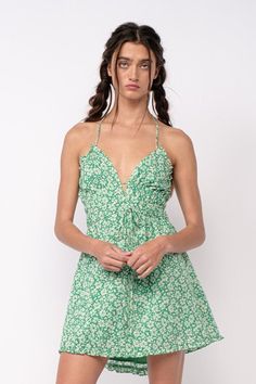 See the Kristen Green Floral Halter Mini Dress at BohoPink.com! Cute green and white floral halter mini dress with open back. Express shipping is available! Green Halter Neck Summer Mini Dress, Summer Printed Halter Neck Mini Dress, Summer Floral Print Mini Halter Dress, Bohemian Halter Neck Printed Mini Dress, Green Floral Print V-neck Mini Dress, Plunge Mini Dress, Plunge Dress, Halter Mini Dress, Green Floral Dress