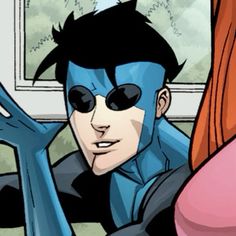 an animated image of a man with blue hair and black glasses sitting in front of a window