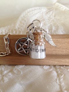 Supernatural Protection Necklace geekery by Uberjewelrydesigns, $8.99 Demon Hunter, Protection Necklace, Pendant Necklaces, Supernatural, Jewelry Necklace Pendant, Geek Stuff, Charms, Accessory Gift, Jewelry Necklaces