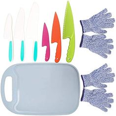 a tray with six knives and five gloves on it, all in assorted colors