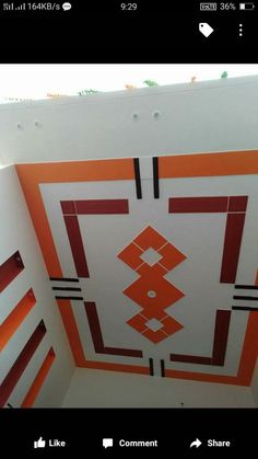 an orange and white ceiling in a room