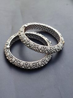 You will receive Set of  2 Pcs Floral Motif Oxidized Silver Bangle Bracelet (kada) Openable Handcrafted Vintage Style Antique Look Indian Traditional Jewelry Metal: Brass Bangle Width : 13 mm inner diameter: 2.5" Approx.   Thank you very much for visiting ! Any questions, please feel free to contact us. Discount for bulk provide. Silver Kada, Brass Bangle, Silver Bangle Bracelet, Jewelry Metal, Silver Bangle Bracelets, Silver Bangle, Indian Traditional, Traditional Jewelry, Oxidized Silver