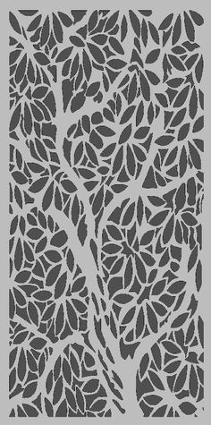 a stencil with leaves on it that looks like an intricate design in grey