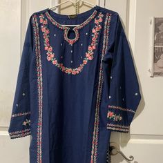 Size 46 (Standard Sizing Large) Lawn Kameez With Chiffon Scarf And Pearl Studded Embroidery On Pajama. Bohemian Blue Set With Floral Embroidery, Bohemian Blue Sets With Floral Embroidery, Bollywood Style Blue Lawn Suit With Intricate Embroidery, Blue Bollywood Lawn Suit With Intricate Embroidery, Bohemian Blue Embroidered Sets, Bohemian Embroidered Blue Sets, Eid Long Sleeve Blouse With Dabka Work, Long Sleeve Blouse Piece With Resham Embroidery For Eid, Blue Lawn Suit With Intricate Embroidery For Festivals