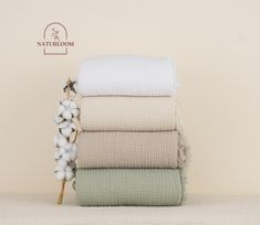 a stack of towels sitting on top of each other