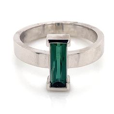 One White Gold CUSTOM Ring. Created in 14K white gold. The stone is a beautiful channel set elongated Green Tourmaline. Modern Baguette Cut Emerald Ring, Modern White Gold Emerald Ring With Baguette Cut, Modern Tourmaline Rings In Emerald Cut, Modern Emerald Ring With Rectangular Stone, Modern Tourmaline Rings With Emerald Cut, Modern Tourmaline Emerald Cut Rings, Green Tourmaline Ring, Custom Ring, Tourmaline Ring