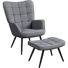 a gray chair and ottoman sitting next to each other