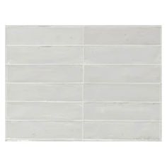 a white tile wall that is very clean and ready to be used in the bathroom