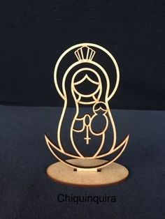 an illuminated nativity figurine is shown on a black background