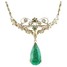 A 14.97tcw Victorian styled Pear Cut Colombian emerald and Round diamond necklace/brooch in solid gold. Handcrafted in 14K yellow gold, the earth-mined emerald is nestled in a four-prong, V setting. The highly detailed basket under the emerald is all handcrafted by our master jeweler to perfectly fit the stone. Decorative gold work features brilliant round diamonds along with emeralds. The chain is easily removable to become a brooch. The chain is 18 inches long. Setting Style: Prong Setting Mat Emerald Jewelry Necklace, Round Diamond Necklace, Emerald Necklace Pendant, Pear Pendant, 14k Yellow Gold Necklace, Solitaire Pendant Necklace, Emerald Pendant, Colombian Emeralds, Solitaire Necklaces