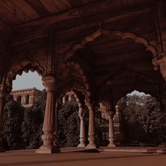 an ornate building with pillars and arches