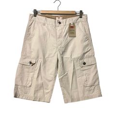 Levi's Cargo Shorts Falls Below Knee Cream Youth Size 18 Regular 29 Waist New With Tags Extra Room In Seat And Thigh 2 Side Pockets 2 Cargo Pocket With Button Close 2 Back Pockets With Button Close Normcore Casual 100% Cottom Comfortable Breathable Material Made In Vietnam 0390 Cargo Pants Youth, Cheap Cargo Shorts, Where To Get Cargo Shorts, Levi's Spring Bottoms With Pockets, Short Cotton Cargo Pants For Spring, Beige Cotton Cargo Shorts For Spring, Levi's Cotton Cargo Bottoms, Levi's Cotton Bottoms With Patch Pockets, Levi's Relaxed Fit Shorts With Pockets