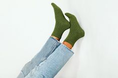 Thermal, moss green ankles are a midweight premium pair of socks featuring a knitted sweater-like design throughout. The thicker knit blend will keep your feet warm and steps soft. Size: + OSFA, W 7-10 Design: + 96 Needle + Mid weight + Reinforced toe & heel + Seamless toe + Sweater knit + Tall ankle Content + Care: + Premium Combed Cotton + Wash Cold/Dry Low + Imported Created by Tailored Union. Knit Ankle Socks, Ankle Sock, Moss Green, Sweater Knit, Ankle Socks, Knitted Sweater, Knee High Sock, Combed Cotton, Wearable Art