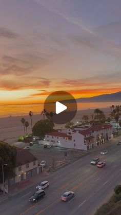 an aerial view of a street at sunset