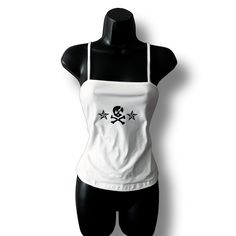 White square neck cami with a black skull and crossbones design. 67% Polyester, 30% Viscose, 3% Elastane, slight stretch. Size up if bust if larger than a B cup. Please handwash this item or machine-wash cold and let it air dry. Heat can alter the design. All items are made to order and can take up to 14 days to make and ship out. The current USPS standard arrival time is 5-8 business days. The current USPS priority arrival time is 1-4 business days. The Christmas delivery cutoff date was Dec. 4 Emo Myspace, Y2k Mall Goth, Slay Outfits, Skull Crossbones, Dry Heat, 90's Grunge, Pretty Princess, White Cami, Scene Emo