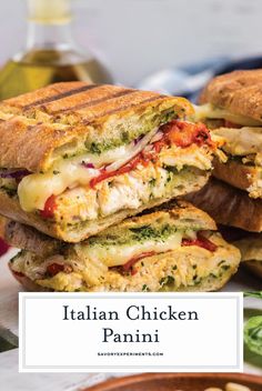 the italian chicken panini is stacked on top of each other