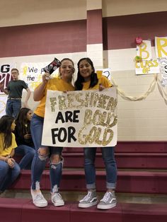 two girls holding a sign that says friends are for god