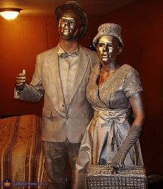 a statue of two people standing next to each other