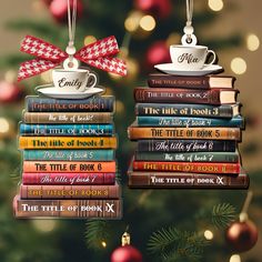 a christmas ornament with books stacked on top of each other in front of a christmas tree