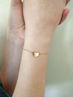 "14K 9K Small heart charm bracelet with Engraved Initial, Solid gold bracelet, Custom Monogram gold bracelet, Personalized gold bracelet, Valentine's Gift, Gift for her, 14K Rose Gold bracelet, Bridesmaid gift, Bridal jewelry, Dainty gold bracelet, FREE EXPRESS SHIPPING Delicate minimalist 14K solid gold bracelet with a small heart charm engraved with one or two initials. A wonderful and thoughtful gift for you and your loved ones! Infinity bracelet: https://www.etsy.com/listing/608986075 Boho e Heart Bracelet For Best Friend And Mother's Day, Heart Bracelet For Mother's Day And Best Friend Gift, Double Heart Charm Jewelry For Best Friend, Heart Charm Double Heart Jewelry For Best Friend, Engraved Heart Bracelet For Friendship On Valentine's Day, Engraved Heart Bracelet For Valentine's Day Friendship, Gold Jewelry For Friendship On Mother's Day, Engraved Heart Bracelet For Friendship, Yellow Gold Heart Jewelry For Friendship