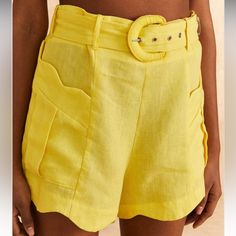 Tailored Pieces Reimagined With A Bright Accent. The Bright Yellow Shorts Will Help You Reach The Most Elevated Style In Its Effortless Fit And Bold Color To Take You From Your 9-5 Schedule To Wherever The Night Takes You! Easy Fit Front Pockets Detachable Belt With Buckle Invisible Zipper 100% Linen Offers Welcome Chic Shorts With Belt Loops For The Beach, Vacation Bottoms With Belt Loops And Short Length, Chic Yellow Shorts, Chic Yellow Shorts With Pockets, Chic Yellow Bottoms With Built-in Shorts, Summer Linen Bottoms With Belt Loops, Vacation Bottoms With Belt Loops And Short Shape, Yellow Short Summer Pants, Yellow Short Pants For Summer