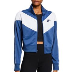 Nike Chevron Track Jacket In Blue And White. From A Huge Collection Of Unworn And Lightly Worn Wardrobe Obtained From A Major Studio Costume Department. Clothing From Shows Including Disney + Shows Big Shot With John Stamos, The Mighty Ducks: Game Changers With Emilio Estevez, Lauren Graham And Josh Duhamel, The Hit Hulu Series Saint X And Hulu Film Quiz Lady. These Were From The Show Big Shot. The Girls' Basketball Team Wore Them As Warm Up Suits And These Were Extra Back-Ups That Were Not Used Blue Sportswear Outerwear For Spring, Blue Spring Sportswear Outerwear, Nike Blue Outerwear For Fall, Blue Nike Outerwear For Fall, Nike Blue Track Jacket For Spring, Blue Nike Track Jacket In Athleisure Style, Nike Blue Track Jacket In Athleisure Style, Nike Blue Athleisure Track Jacket, Blue Sportswear Track Jacket For Fall