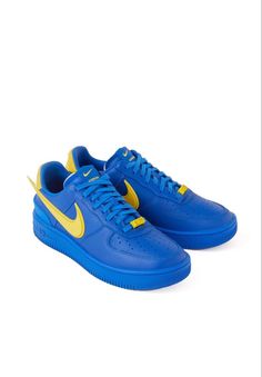 Nike Air Force 1 Sporty Streetwear Shoes, Nike Air Force 1 With Rubber Sole, Blue Nike Air Force 1 For Streetwear, Sporty Blue Nike Air Force 1 For Light Sports, Low-top Sports Sneakers With Embossed Logo, Sports Sneakers With Embossed Logo And White Sole, Custom Blue Lace-up Sneakers, Nike Air Force 1 With Rubber Waffle Outsoles, Casual Blue Nike Air Force 1 With Boost Midsole