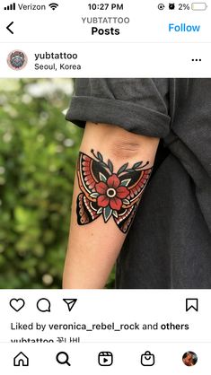 a person with a tattoo on their arm