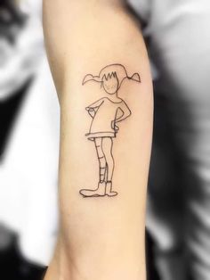 a person with a small tattoo on their arm