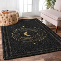 an area rug with a golden moon and stars on it in front of a chair