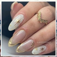 Looking to add some glamour to your manicure? Check out these 8 stunning gold nail ideas and tips for a luxurious and eye-catching look. From chic metallic accents to elegant glitter designs, elevate your nail game with these gorgeous gold nail inspirations. Perfect for any occasion, these manicure ideas will make your nails shine bright like gold! Baroque Nails Art, Gold Nails Inspo Aesthetic, Black And White And Gold Nails, White With Gold Nails, Black White Gold Nails, Nails Gold Accent, Nails With Gold Design, Gold Tip Nails, New Years Eve Nails