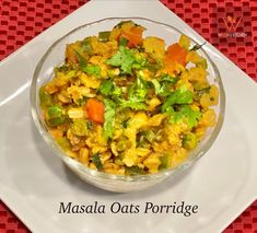 masala oats porridge in a glass bowl on a white plate