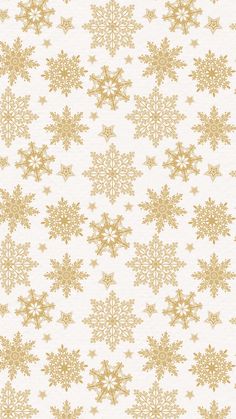 a white and gold snowflake pattern with many smaller snowflakes on it