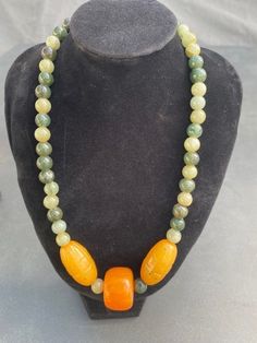 One of a kind necklace made using repurposed Chinese jade and vintage orange beads. I love not wasting things and taking them from old fashioned to updated. Orange Beaded Necklace, Chinese Jade, Vintage Orange, Pendant Necklaces, Old Fashioned, Jewelry Necklace Pendant, Jade, Beaded Necklace, Jewelry Necklaces