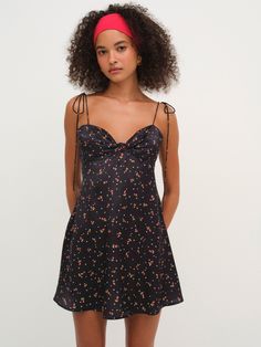 Chic and effortless, the Adira black mini dress is the perfect sundress for warm days and balmy nights. With gathering and a fixed knit and the neckline, this simple floral dress has true minimalist appeal. Simple Floral Dress, Mini Dress Black, Black Mini Dress, Wedding Lingerie, Bohemian Dress, Black Mini, Fall Dresses, Black Design, Designer Outfits Woman