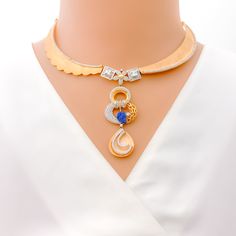 Make a statement with our sparkling CZ hanging rose gold necklace set. Crafted from 18k yellow, rose, and white gold, this elegant piece features shimmering cubic zirconia stones that catch the light beautifully. With a weight of 42.3 grams, this set is perfect for any special occasion. The set comes complete with matching earrings and a secure lobster lock. PRODUCT DETAILS Gold Purity(karat): 18k Item Weight(grams): 42.3 Item Finish: Yellow + Rose + White Gold Stone: Cubic Zirconia Lock Style: Elegant Diamond Necklace With Detachable Cubic Zirconia Pendant, Luxury Gold Bridal Necklace With Sparkling Stones, Luxury Plated Cubic Zirconia Necklace, Luxury Cubic Zirconia Necklaces With Detachable Pendant, Luxury Cubic Zirconia Necklace With Detachable Pendant, Luxury Gold Bridal Necklace With Cubic Zirconia, Luxury Bridal Necklace In Yellow Gold With Cubic Zirconia, Elegant Gold Bridal Necklace With Detachable Pendant, Rose Gold Necklace Set