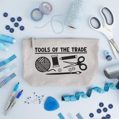 tools of the trade bag surrounded by sewing supplies