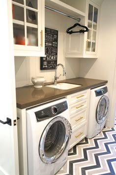 a washer and dryer in a small room